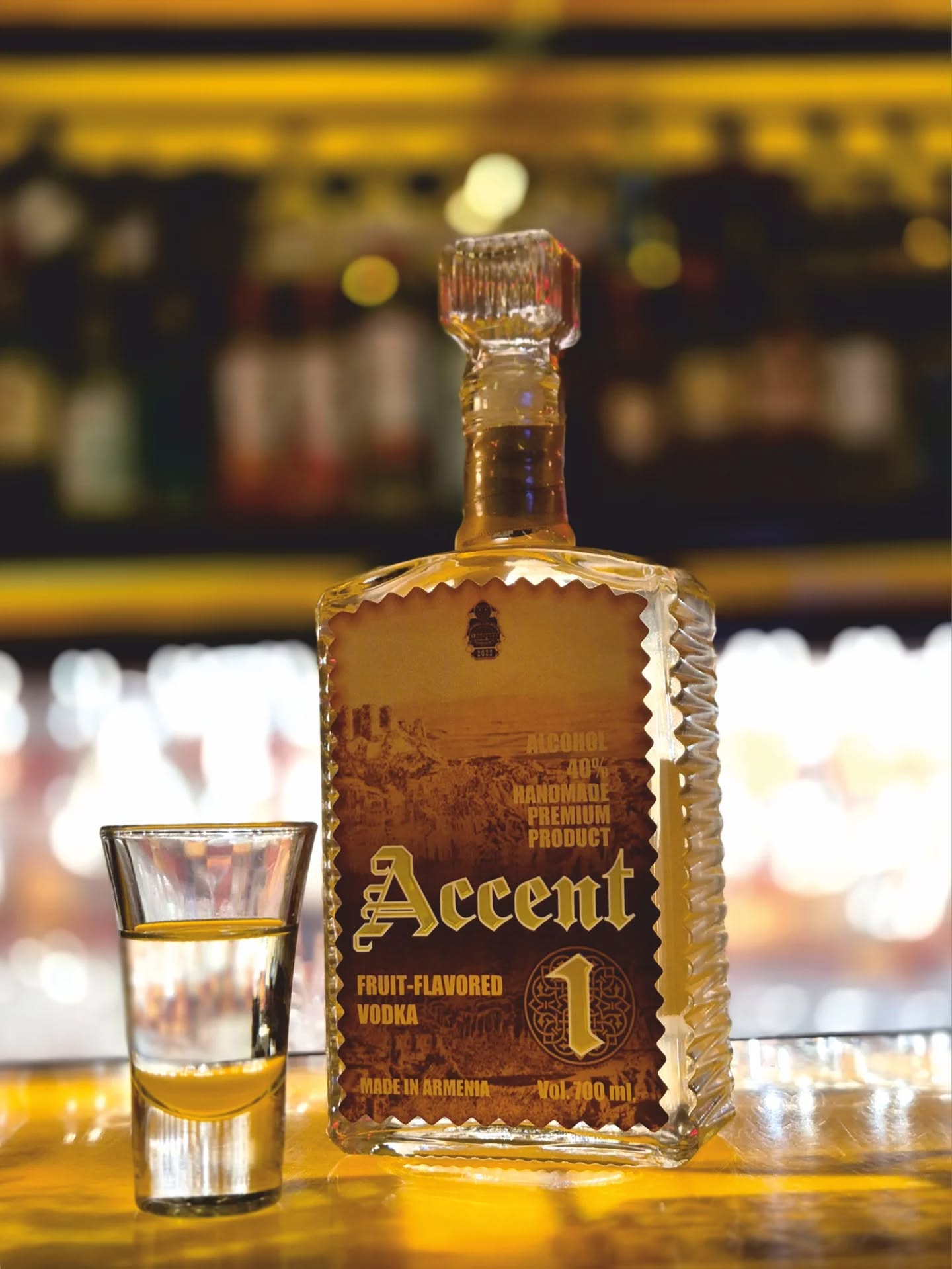 Accent 1 bottle with shot glass at a cocktail bar